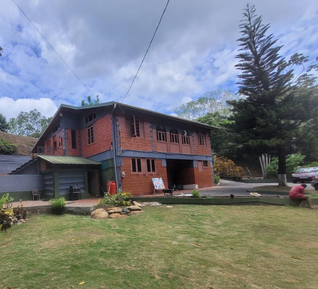 Maracas Valley, Two-Story Rust..